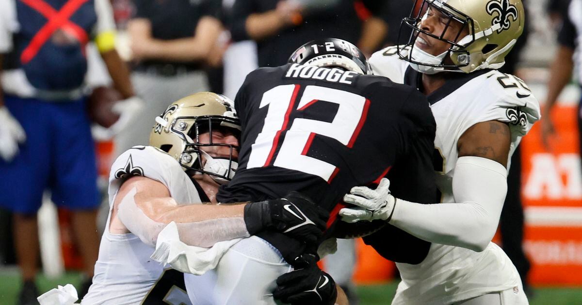 Atlanta Falcons wide receiver KhaDarel Hodge (12) walks off the