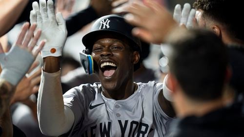 New York Yankees' Jazz Chisholm celebrates after his home run during the ninth inning of a baseball game against the Philadelphia Phillies, Monday, July 29, 2024, in Philadelphia. (AP Photo/Chris Szagola)