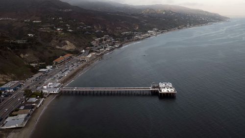 FILE - This aerial view shows the Malibu Pier in Malibu, Calif., Thursday, Aug. 31, 2023. (AP Photo/Jae C. Hong, File)