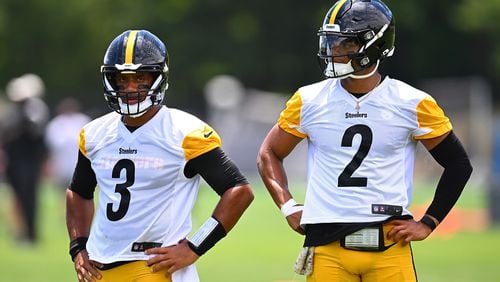 Russell Wilson (3) looks on alongside Justin Fields (2) of the Pittsburgh Steelers during the Pittsburgh Steelers OTA offseason workout at UPMC Rooney Sports Complex on June 6, 2024, in Pittsburgh. (Joe Sargent/Getty Images/TNS)