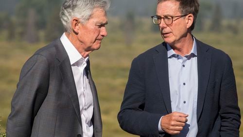 Federal Reserve Chairman Jerome Powell, left, speaks with Governor of the Bank of Canada Tiff Macklem outside of the Jackson Hole Economic Symposium at Jackson Lake Lodge in Grand Teton National Park near Moran, Wyo., on Aug. 23, 2024. (AP Photo/Amber Baesler)