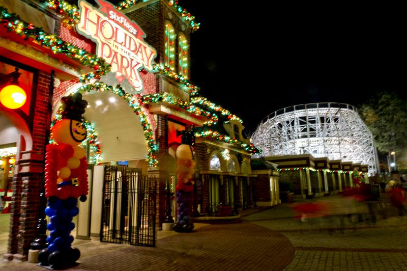 Visitors exit Six Flags Over Georgia in Austell on Friday, November 21, 2014. The park has been decorated in 10 sections of holiday lights for the first time since 1990. Holiday in the Park runs through Jan.4, 2015. JONATHAN PHILLIPS / SPECIAL