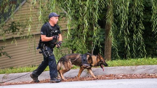 A manhunt was underway in Clayton County for a third suspect after two others were arrested following a police chase. JOHN SPINK / JSPINK@AJC.COM