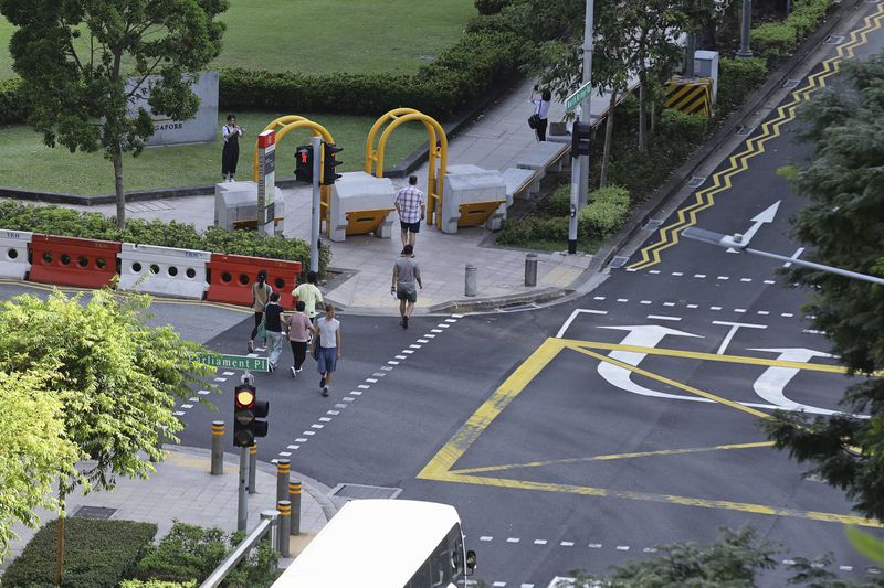 Anti-crash vehicle barriers are seen installed along the pavement outside Parliament House, where Pope Francis is scheduled to meet Singapore Prime Minister Lawrence Wong and President Tharman Shanmugaratnam, in Singapore, Saturday, Sept. 7, 2024. (AP Photo/Suhaimi Abdullah)