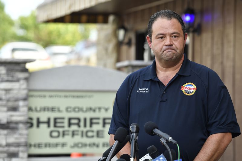 London, Ky. Mayor Randall Weddle makes comments to the media regarding the shooting that happened near his town along I-75 in London, Ky., Sunday, Sept. 8, 2024. (AP Photo/Timothy D. Easley)