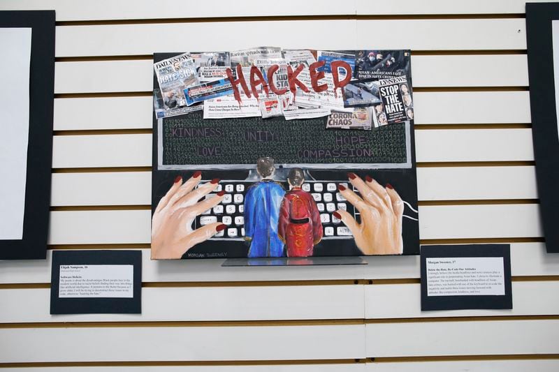 Artwork made by Morgan Sweeney , 17 displayed during the opening of the art contest named "Hacked the Hate" made by young artist during the Summer, Thursday Aug. 8, 2024, in New York. (AP Photo/Kena Betancur)