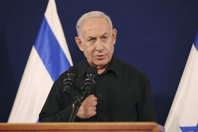 FILE - Israeli Prime Minister Benjamin Netanyahu speaks during a news conference in the Kirya military base in Tel Aviv, Israel, on Oct. 28, 2023. Israeli Prime Minister Benjamin Netanyahu told his Cabinet on Sunday that there had been a “dramatic drop” in U.S. weapons deliveries for Israel's war effort in Gaza, doubling down on a claim that the Biden administration has denied and underscoring the growing strains between the two allies. (Abir Sultan/Pool Photo via AP, File)