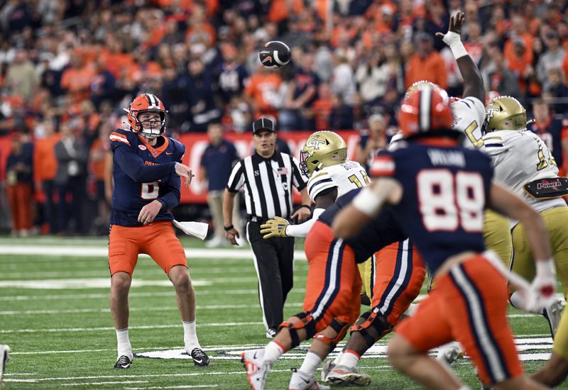 Syracuse quarterback Kyle McCord (6) throws a passduring the first half of an NCAA football game against Georgia Tech, Saturday, Sept. 7, 2024 in Syracuse, N.Y. (AP Photo/Hans Pennink)