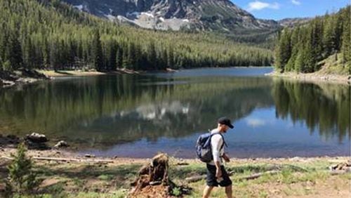 Bendâs Jeremy Dickman hikes along the shore of Strawberry Lake. (Mark Morical/Bend Bulletin/TNS)