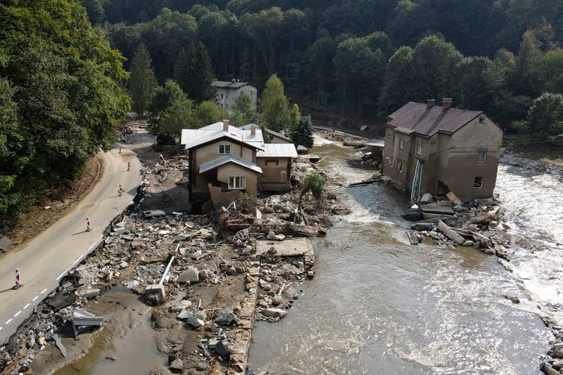 A view of damaged houses after recent floods near Pisecna, Czech Republic, Thursday, Sept. 19, 2024. (AP Photo/Petr David Josek)