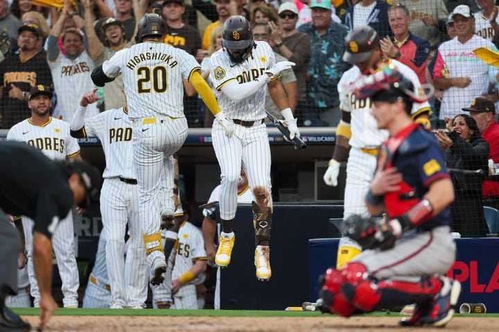 San Diego Padres catcher Kyle Higashioka (20) celebrates a solo home run against the Atlanta Braves during the second inning of National League Division Series Wild Card Game Two at Petco Park in San Diego on Wednesday, Oct. 2, 2024.   (Jason Getz / Jason.Getz@ajc.com)