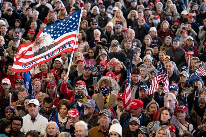 Supporters of President Donald Trump listen to speakers during a "Stop the Steal" rally, featuring Lin Wood and Sidney Powell, in Alpharetta, Georgia, on December 2, 2020. (Ben Gray/Atlanta Journal-Constitution/TNS)