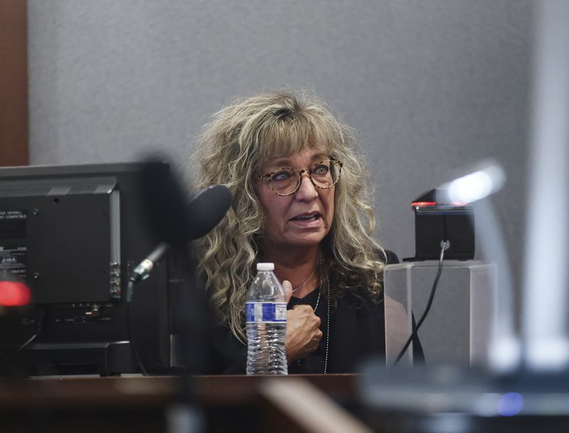 District Judge Mary Kay Holthus becomes emotional as she testifies against Deobra Redden during Redden's trial at the Regional Justice Center in Las Vegas, Thursday, Sept. 5, 2024. (Rachel Aston/Las Vegas Review-Journal via AP)