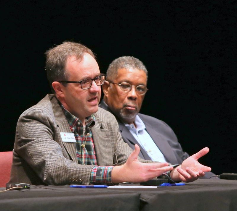 LaGrange Mayor Jim Thornton (left) speaks at a recent trustbuilding event at LaGrange College for state police as Carl Von Epps listens. CONTRIBUTED BY LAGRANGE COLLEGE