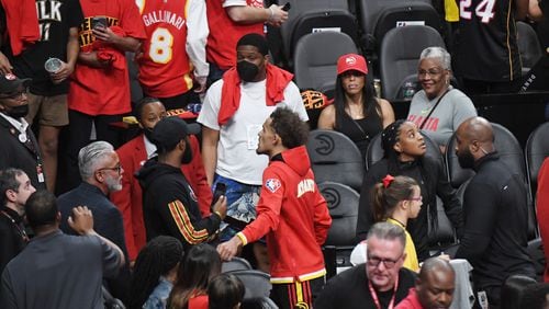 Hawks guard Trae Young leaves at the end of Game 4 on Sunday night at State Farm Arena. Miami won 110-86. (Hyosub Shin / Hyosub.Shin@ajc.com)