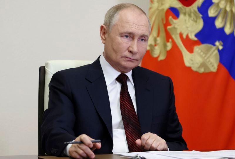 Russian President Vladimir Putin attends a ceremony to open social infrastructure facilities in Russia's new constituent entities via videoconference at the Novo-Ogaryovo state residence, outside Moscow, Russia, Monday, Sept. 30, 2024. (Mikhail Metzel, Sputnik, Kremlin Pool Photo via AP)