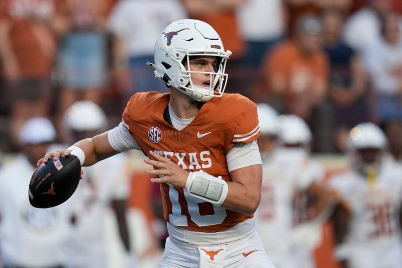 Texas quarterback Arch Manning (16) looks to throw against the Louisiana-Monroe during the first half of an NCAA college football game in Austin, Texas, Saturday, Sept. 21, 2024. (AP Photo/Eric Gay)