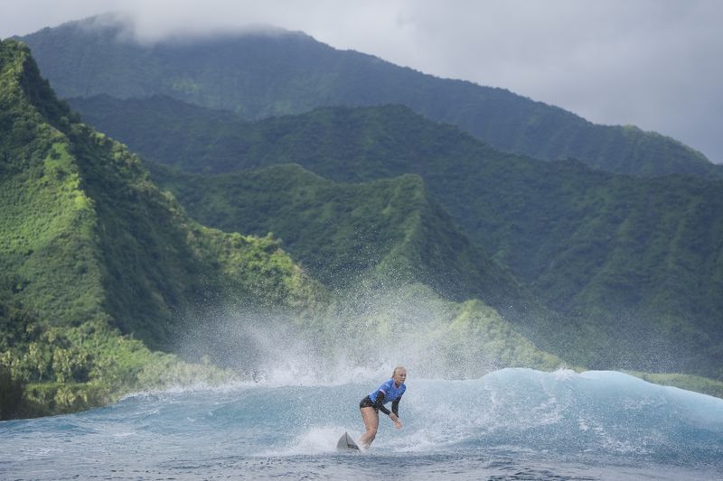 Tatiana Weston-Webb, of Brazil, surfs during the gold medal match of the surfing competition at the 2024 Summer Olympics, Monday, Aug. 5, 2024, in Teahupo'o, Tahiti. (AP Photo/Gregory Bull)