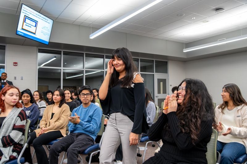 Yadhira Alvarado-Zarate, a junior at Duluth’s McClure Health Science High School, is awarded with a $40,000 scholarship from BigFuture on Jan. 19, 2024, in Gwinnett County. (Jamie Spaar for The Atlanta Journal-Constitution)