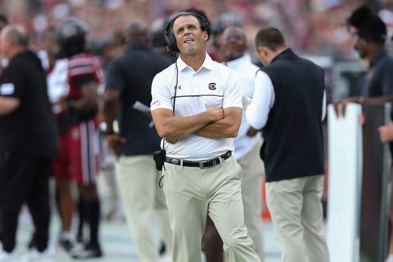 South Carolina head coach Shane Beamer checks the scoreboard after a touchdown by Old Dominion during the first half of an NCAA college football game Saturday, Aug. 31, 2024, in Columbia, S.C. (AP Photo/Artie Walker Jr.)