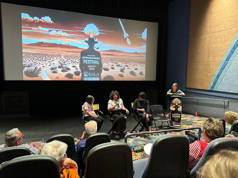 Panelists answer questions during a discussion following the first screening of "First We Bombed New Mexico" during the Oppenheimer Film Festival in Los Alamos, New Mexico on Saturday, Aug. 17, 2024. (AP Photo/Susan Montoya Bryan)