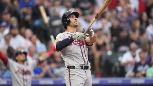 Atlanta Braves' Matt Olson watches the flight of his grand slam off Colorado Rockies starting pitcher Dakota Hudson, not pictured, in the third inning of a baseball game Saturday, Aug. 10, 2024, in Denver. The Braves won 11-8.  (AP Photo/David Zalubowski)