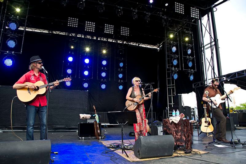 Linford Detweiler, Karin Bergquist, and Brad Meinerding of Over the Rhine perform during the Forecastle Music Festival at Waterfront Park on July 19, 2015, in Louisville, Ky. (Photo by Amy Harris/Invision/AP)