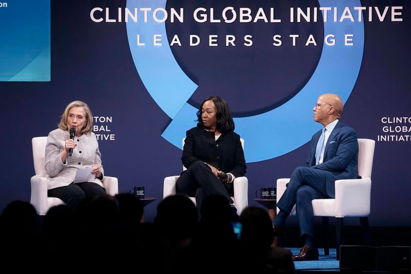 Former U.S. Secretary of State, Hillary Clinton, from left, speaks as American television producer and screenwriter, Shonda Rhimes, and President of the Ford Foundation, Darren Walker, listen during the Clinton Global Initiative, on Tuesday, Sept. 24, 2024, in New York. (AP Photo/Andres Kudacki)