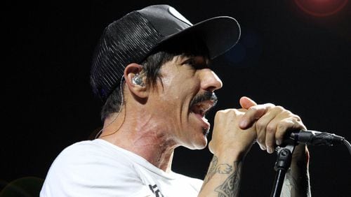 Anthony Kiedis performs with the Red Hot Chili Peppers at Atlanta's Philips Arena on April 14, 2017. He is the subject of a new biopic which is set to shoot in Georgia next year. (Robb Cohen for the AJC)