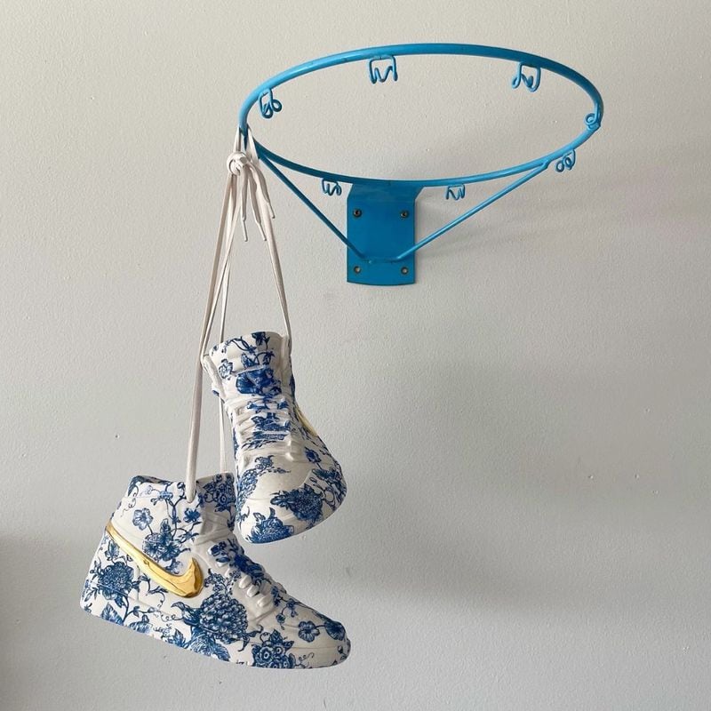 At Maune Contemporary: Brock DeBoer's "Toiled Jordan 1 (Pair) w. Gold" (2023). Photo: Courtesy of Maune Contemporary