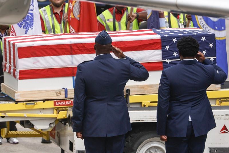 The body of Senior Airman Roger Fortson returns to Atlanta via Air Force dignified transfer at Hartsfield-Jackson International Airport on Tuesday, May 14, 2024. Fortson, a 23-year-old active-duty Senior Airman, was fatally shot by a Florida Sheriff’s Deputy on May 3. (Natrice Miller/ AJC)
