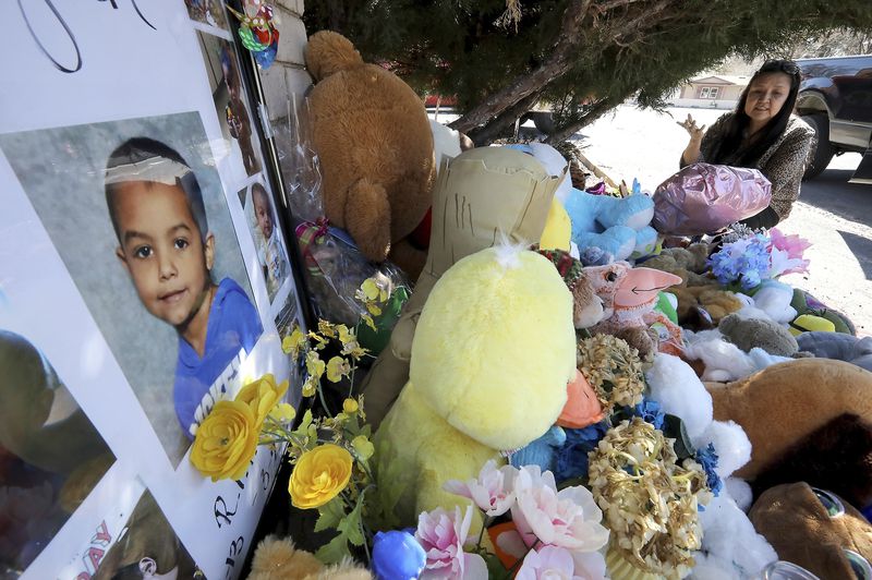 FILE - In this March 4, 2020, file photo, Wanda Ahasteen stops by a memorial for a 6-year-old Deshaun Martinez in Flagstaff, Ariz. Anthony Martinez was convicted in a jury trial Thursday, May 23, 2024, of first-degree murder and other crimes in the 2020 starvation death of his 6-year-old son Deshaun. (Jake Bacon/Arizona Daily Sun via AP, File)
