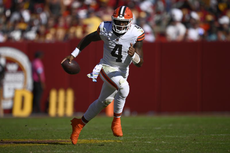 Cleveland Browns quarterback Deshaun Watson (4) scrambles against the Washington Commanders during the second half of an NFL football game in Landover, Md., Sunday, Oct. 6, 2024. (AP Photo/Nick Wass)