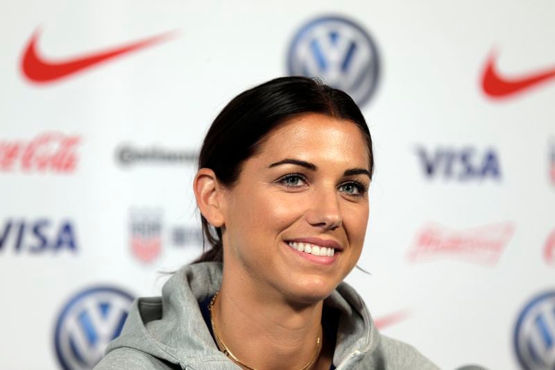 FILE - Alex Morgan, a member of the United States women's national soccer team, speaks to reporters during a news conference in New York, Friday, May 24, 2019. (AP Photo/Seth Wenig, File)