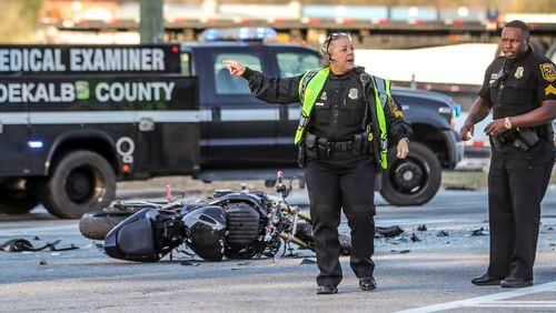 March 28, 2022 Atlanta: A fatal crash involving a motorcycle caused delays on Moreland Avenue in DeKalb County on Monday morning, March 28, 2022. At one point all southbound lanes were shut down while authorities investigated the crash at South River Industrial Boulevard, according to the Georgia Department of Transportation. The wreck was reported just after 7:30 a.m. and was cleared by just after 9 a.m. Investigators believe a driver turned left in front of the motorcycle, causing the bike to crash and killing its rider, according to DeKalb police. The motorcyclist was not identified. Charges are pending for the driver of the car, who also has not been identified, police said. Moreland Avenue was shut down while the man’s body was removed by the DeKalb County Medical Examiner’s Office. His crumpled motorcycle could be seen lying in the southbound lanes. (John Spink / John.Spink@ajc.com)


