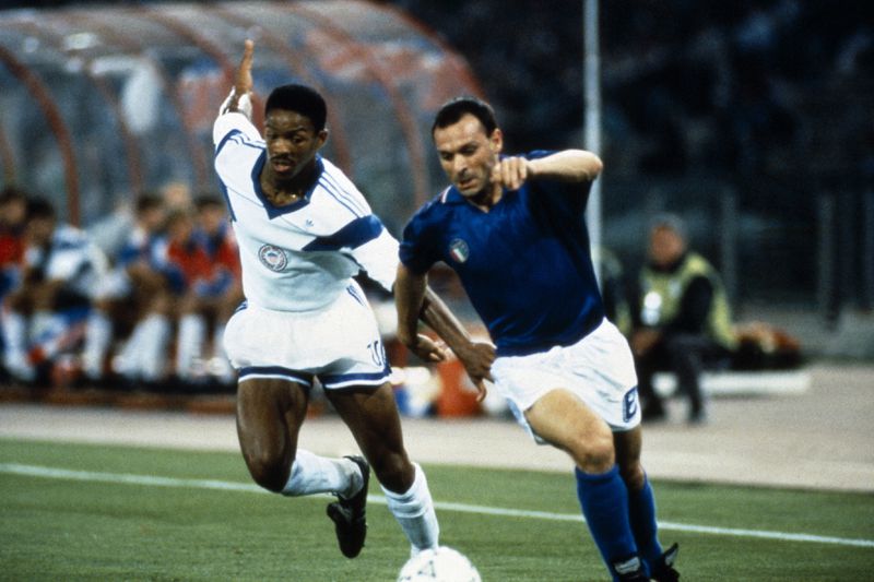 Italy's Salvatore "Totò" Schillaci, right, in action during a World Cup soccer match between Italy and the United States, in Rome, on June 14, 1990. (LaPresse via AP)