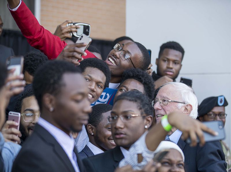 11/21/2019 -- Atlanta, Georgia -- U.S. Senator Bernie Sanders takes a selfie with supporters following his speech during a New Deal Democrats Rally at Morehouse College in Atlanta, Thursday, November 21, 2019. (Alyssa Pointer/Atlanta Journal Constitution)