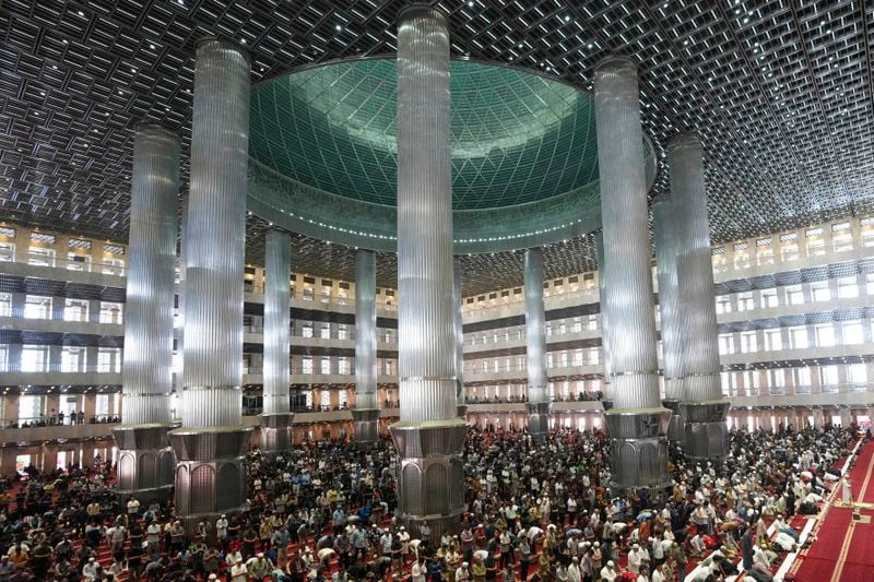 Muslims perform Friday prayer at Istiqlal Mosque in Jakarta, Indonesia, Friday, Aug. 9, 2024. (AP Photo/Tatan Syuflana)