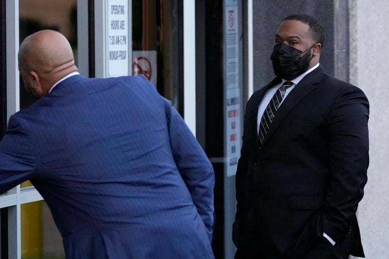 Former Memphis police officer Demetrius Haley, right, arrives at the federal courthouse before the start of jury selection of the trial in the Tyre Nichols case Monday, Sept. 9, 2024, in Memphis. (AP Photo/George Walker IV)