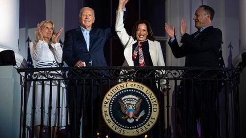 President Joe Biden (center left) and Vice President Kamala Harris (center right), with their spouses, Jill Biden and Doug Emhoff, watch the Independence Day fireworks display over the National Mall on July 4. (Evan Vucci/AP)