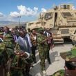 Kenya's President William Ruto, center left, visits Kenyan police, part of a UN-backed multinational force, at their base in Port-au-Prince, Haiti, Saturday, Sept. 21, 2024. (AP Photo/Odelyn Joseph)