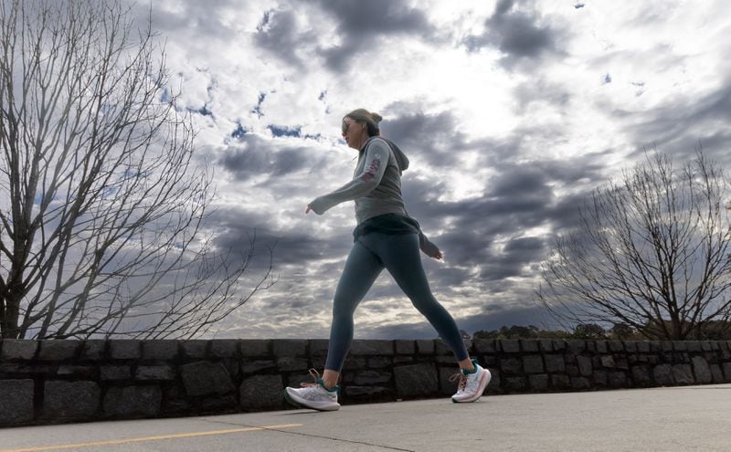 Caroline Molesphini got her walk in at Atlanta's Chastain Park as a cold front began its move into the metro area.