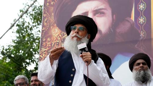 Zaheerul Hassan Shah, the deputy chief of a radical Islamist party, speaks to his supporters during a gathering in Lahore, Pakistan, Sunday, July 28, 2024. Pakistan's police on Monday, July 29, arrested Shah on the charge of ordering the killing of the chief justice over his alleged support to the minority Ahmadi community, officials said. AP Photo/K.M. Chaudary)