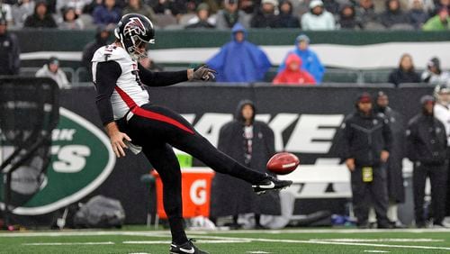 Atlanta Falcons punter Bradley Pinion (13) in action against the New York Jets during an NFL football game Sunday, Dec. 3, 2023, in East Rutherford, N.J. (AP Photo/Adam Hunger)