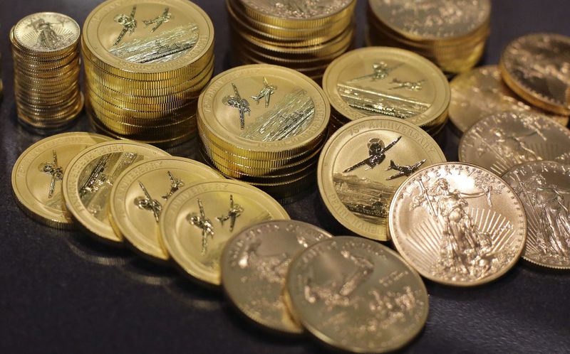 FILE - Gold coins are displayed at the office of Philip Diehl in Austin, Texas on July 1, 2016. (AP Photo/Eric Gay, File)