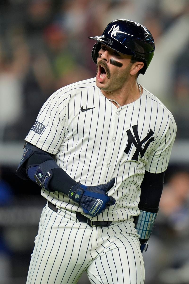 New York Yankees' Austin Wells reacts after hitting a three-run home run during the seventh inning of a baseball game against the Kansas City Royals at Yankee Stadium, Monday, Sept. 9, 2024, in New York. (AP Photo/Seth Wenig)