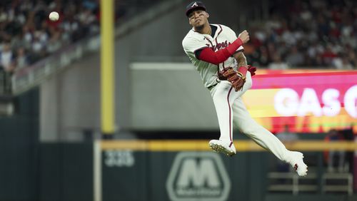 Atlanta Braves shortstop Orlando Arcia (11) throws to first base to retire New York Mets outfielder Jesse Winker during the seventh inning at Truist Park, Tuesday, Sept. 24, 2024, in Atlanta. The Braves won 5-1. (Jason Getz / AJC)