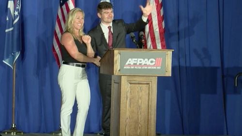 A screenshot of Rep. Marjorie Taylor Greene and Nick Fuentes, the leader of the America First Political Action Conference, from video of event shared online.