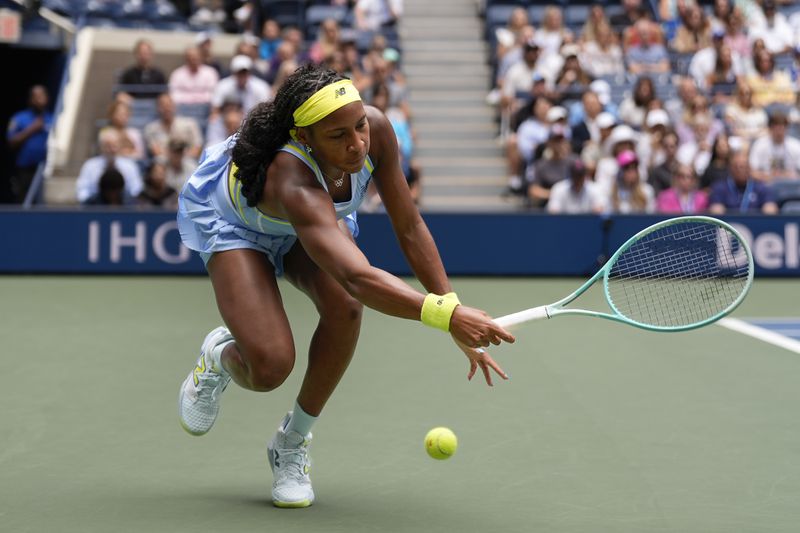 Coco Gauff, of the United States, can't catch up with a shot from Elina Svitolina, of Ukraine, during the third round of the U.S. Open tennis championships, Friday, Aug. 30, 2024, in New York. (AP Photo/Seth Wenig)