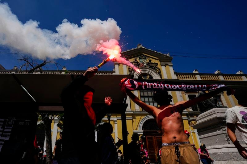 Pro-Palestinian supporters protest in Santiago, Chile, Saturday, Oct. 5, 2024. (AP Photo/Esteban Felix)